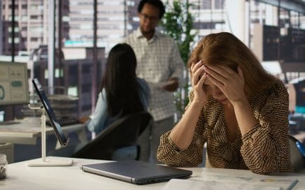 Unwell businesswoman in multinational company battles burnout and anxiety