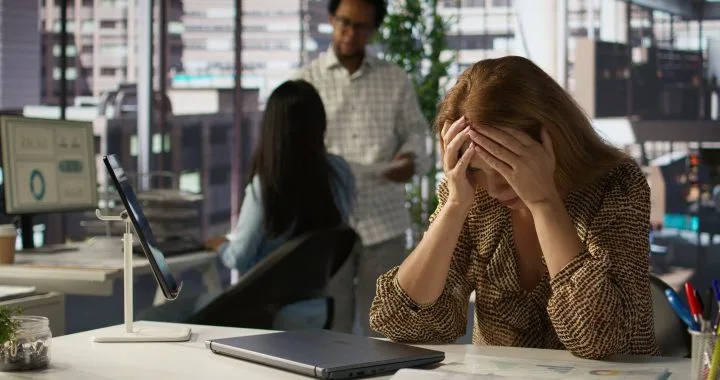 unwell businesswoman multinational company battles burnout anxiety 720x380.jpg