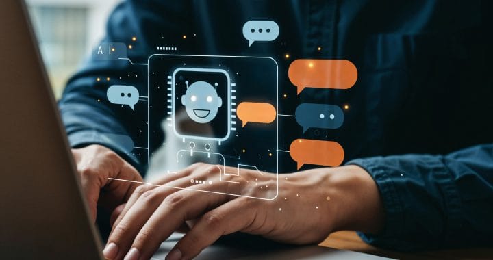 man using laptop with chatbot interface