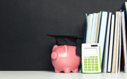 College graduate student diploma piggy bank