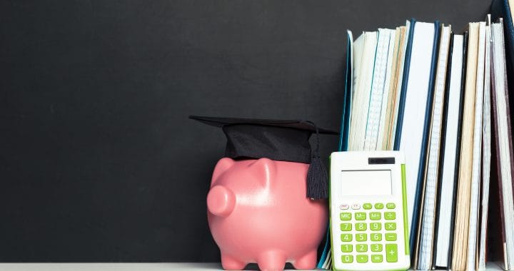 College graduate student diploma piggy bank