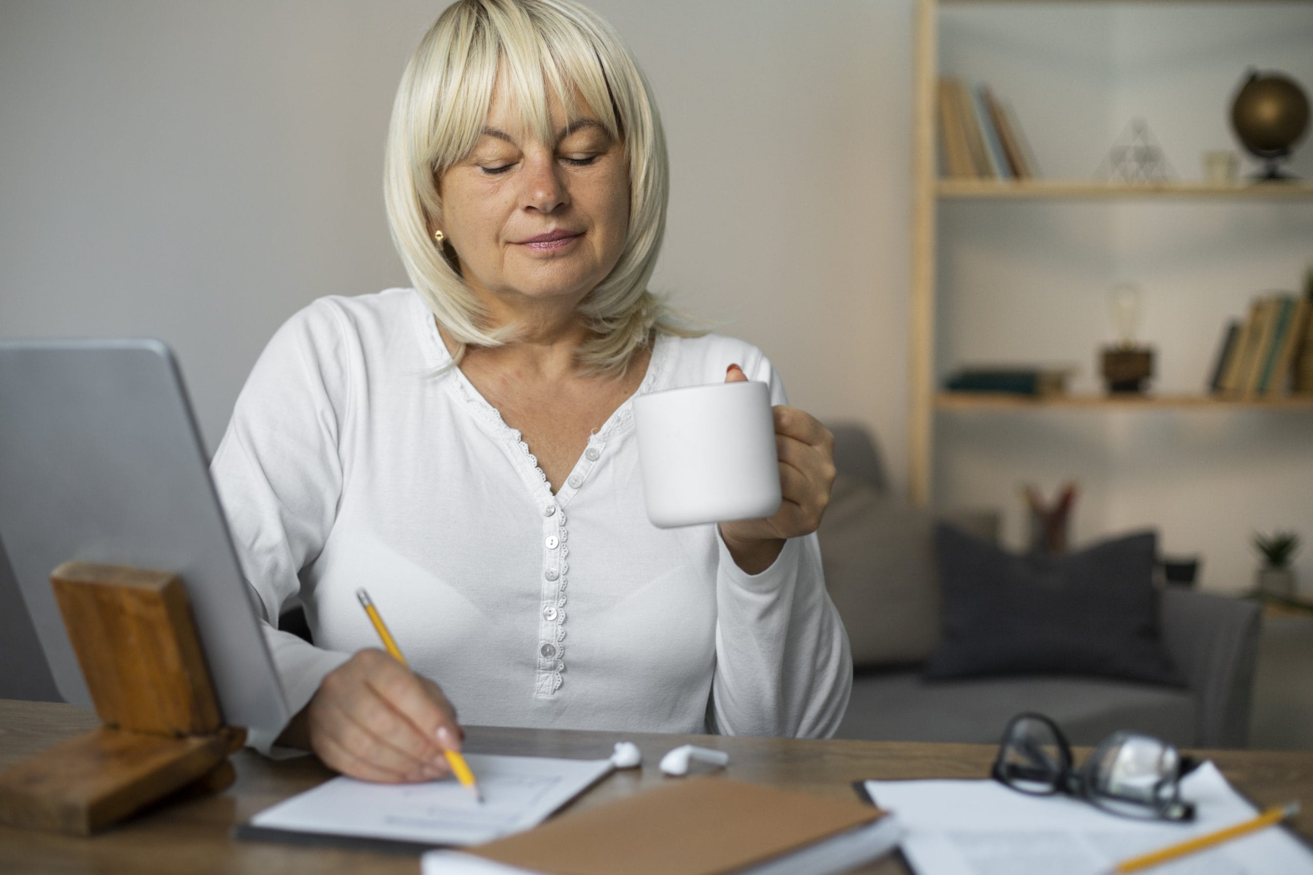 senior woman taking online class her tablet